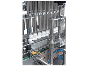 BOTTLE FILLING CAPPING MACHINE