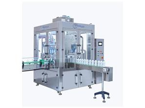 BOTTLE FILLING AND SEALING MACHINE